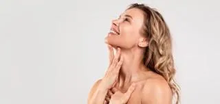 beautiful woman showing her chin after surgery