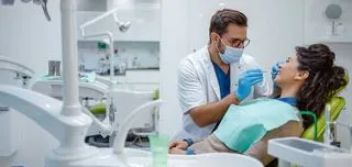dental-professional-is-examining-the-oral-health-of-a-patient